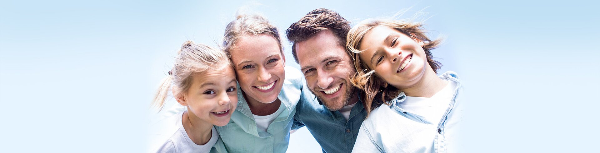happy family and dentist in Centerville provides all dental realted treatments