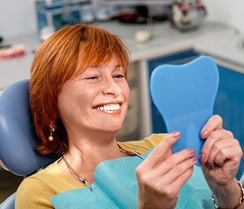 Dr. Daniel Cobb, Alex Bell Dental Image Of Smiling Matured Woman